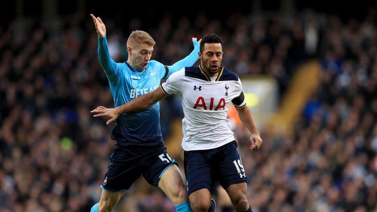Jay Fulton puts Mousa Dembele under pressure