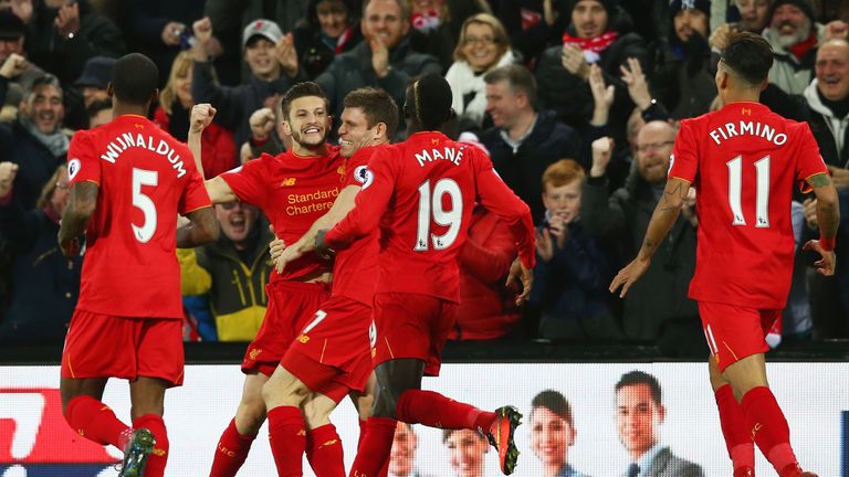 Adam Lallana (second from left) celebrates scoring the opening goal