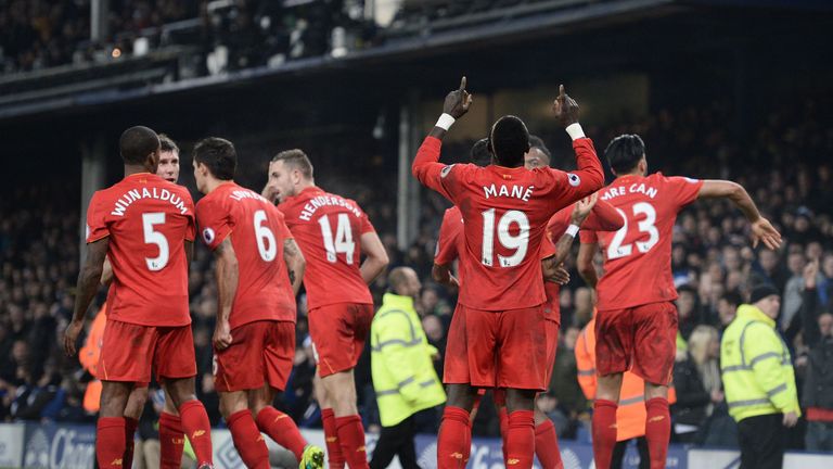 Liverpool players celebrate Mane's winner 