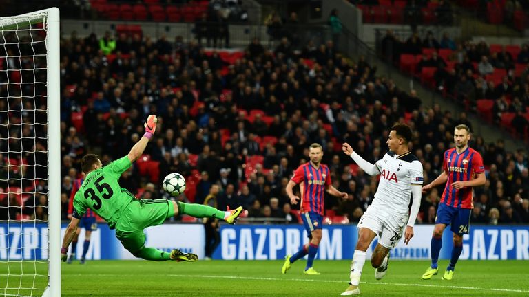 Alli's effort is turned into his own net by Igor Akinfeev for Tottenham's third goal