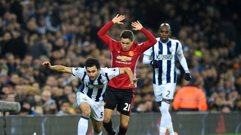 Claudio Yacob is fouled by Ander Herrera during the first half