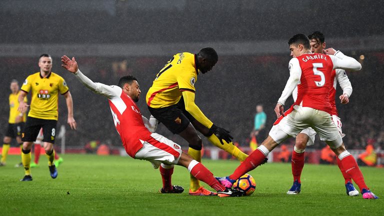 M'Baye Niang (C) competes for the ball against Francis Coquelin (L) and Gabriel (R) 