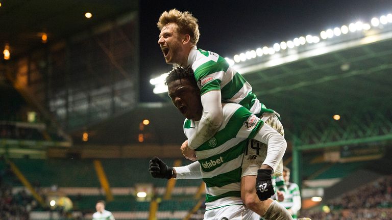 Celtic's Dedryck Boyata (bottom) celebrates his goal with Stuart Armstrong