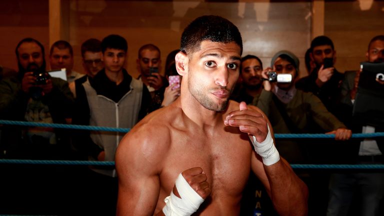 Khan won an online poll, voted for by Pacquiao's 110,000 followers to face the Filipino