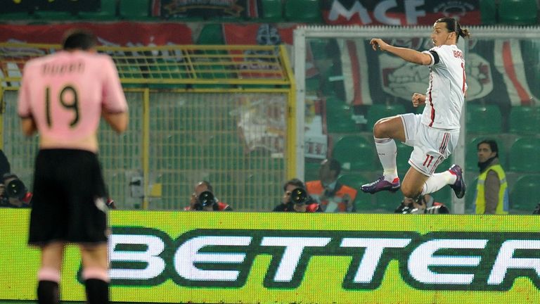Ibrahimovic (right) celebrates after scoring against Palermo