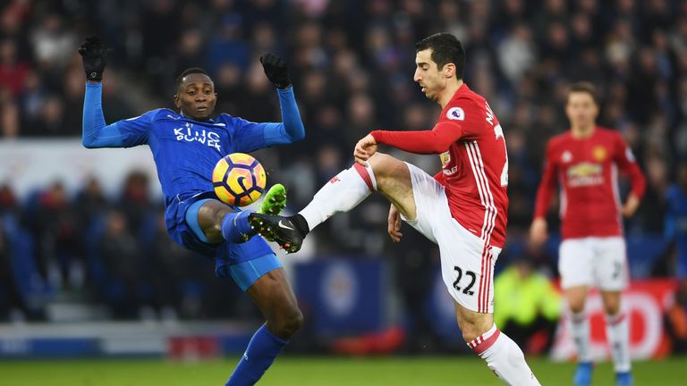 Henrikh Mkhitaryan (right) and Wilfred Ndidi battle for the ball