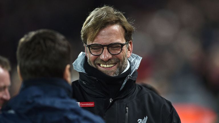 Jurgen Klopp and Mauricio Pochettino (left) shake hands before kick-off