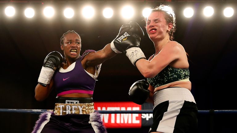 Clarissa Shields lands a punch on Szilvia Szabados during their historic headline fight