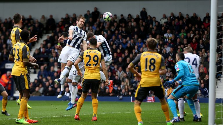 Craig Dawson heads home West Brom's third goal against Arsenal