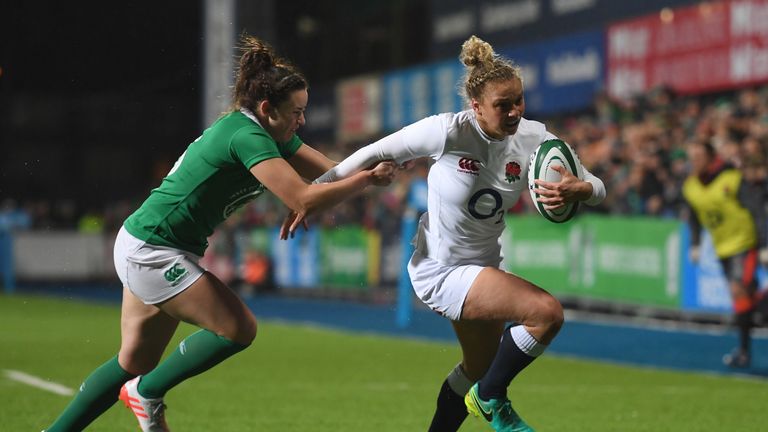 England's Kay Wilson is tackled by Kim Flood of Ireland on Friday