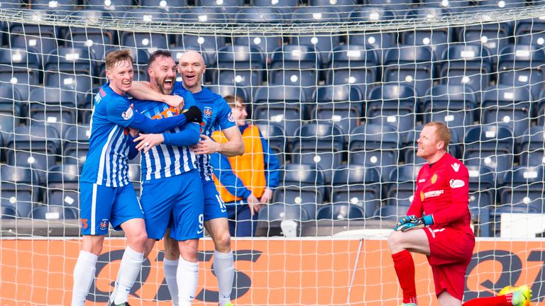 Kris Boyd (centre) celebrates his 200th league goal with Conor Sammon (right) and Sean Longstaff but missed a late penalty against Motherwell as Kilmarnock lost 2-1