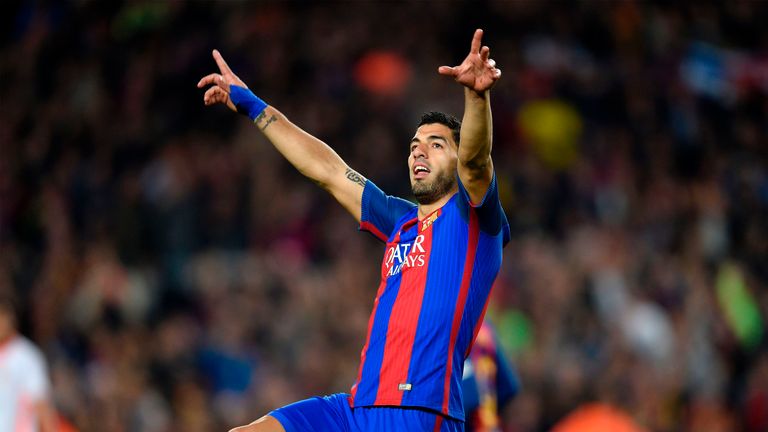 Luis Suarez celebrates after making it 1-1