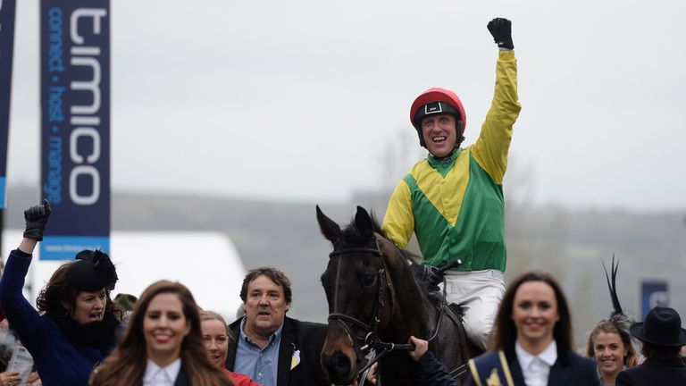 The 'intruder' (blue shirt) leads Sizing John in