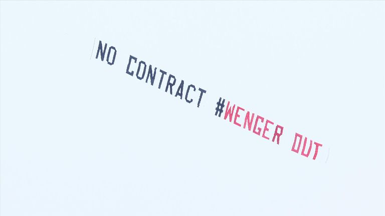 One banner flown over The Hawthorns called for the Arsenal boss to leave...