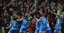 King strikes late to deny Reds