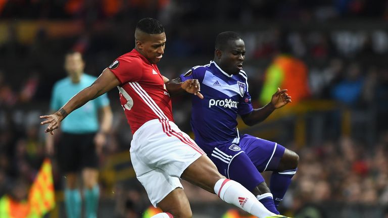 Frank Acheampong is tackled by Antonio Valencia