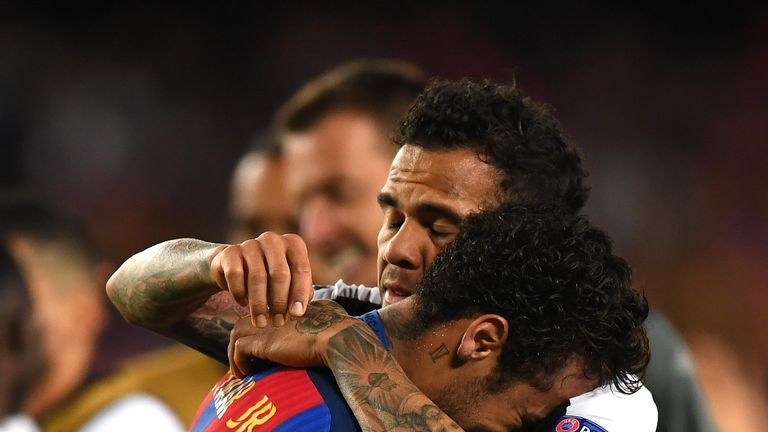 Neymar embraced by Dani Alves after Juventus knocked out Barcelona in the Champions League