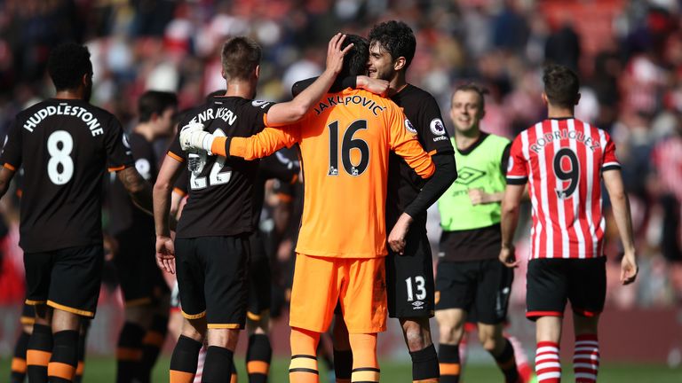 Hull City players celebrate with Eldin Jakupovic