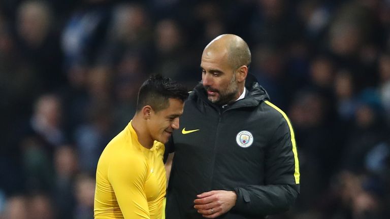 Pep Guardiola (right) said in April he expected a number of clubs to be monitoring Alexis Sanchez's contract situation