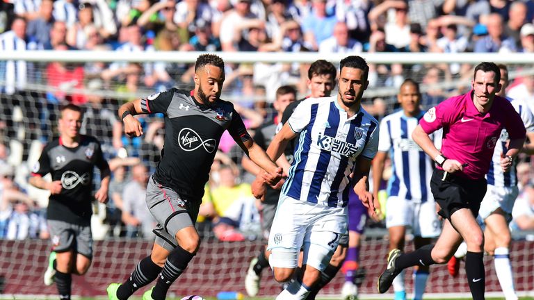 Nathan Redmond takes the ball past Nacer Chadli as Southampton claimed victory away from home