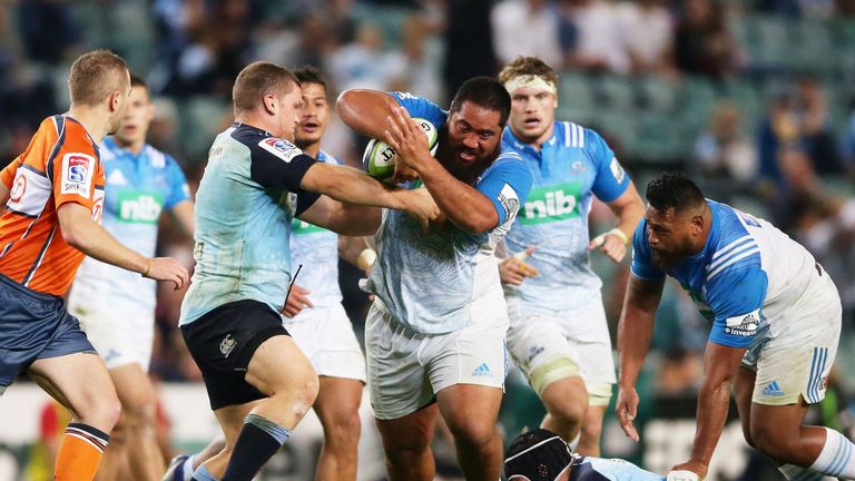 Charlie Faumuina carries for the Blues