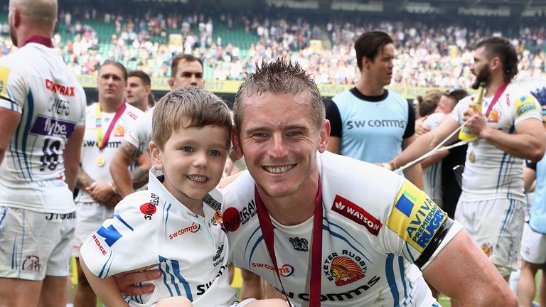 Gareth Steenson celebrates with his son Oscar