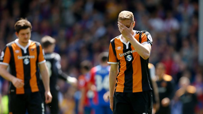 Michael Dawson reacts as Hull City are relegated to the Championship 
