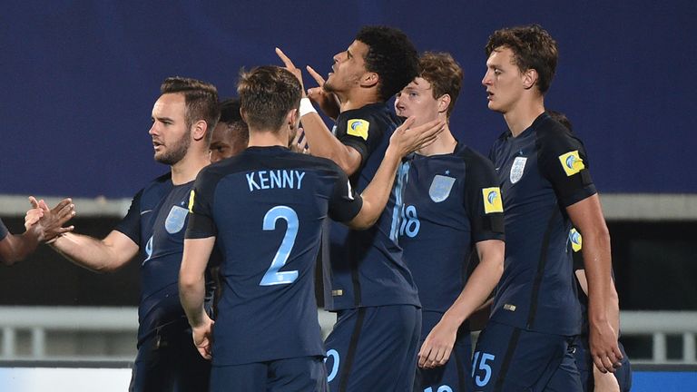 Dominic Solanke celebrates his goal (centre) with team-mates 