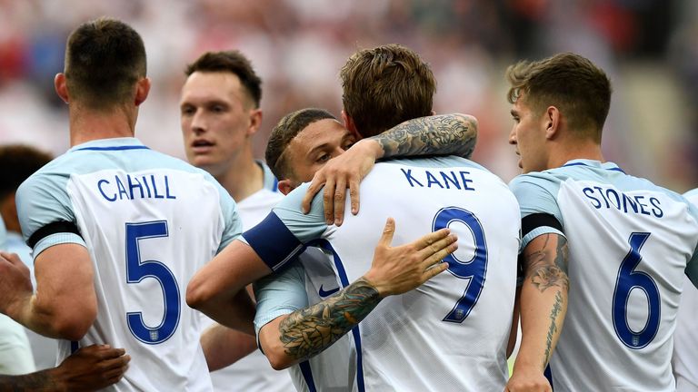 Kane is congratulated by his England and Spurs team-mate Kieran Trippier