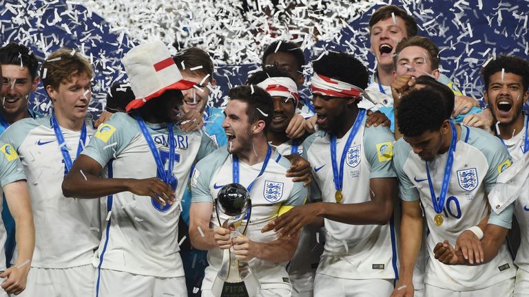 England's players celebrate with the trophy having won the U20 World Cup