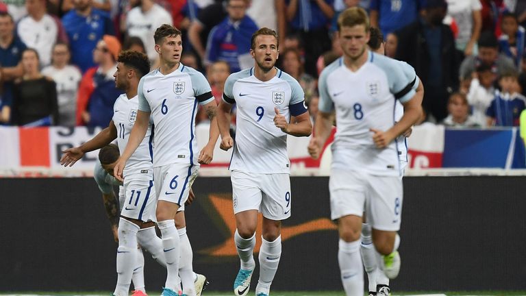 Harry Kane (centre) celebrates having scored twice for England