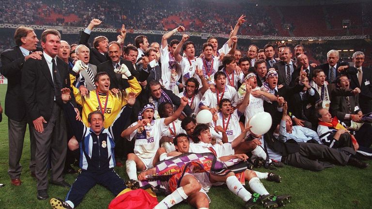 Real Madrid's players, and manager Jupp Heynckes (far left, top row), celebrate their win over Juventus in the 1998 Champions League final 