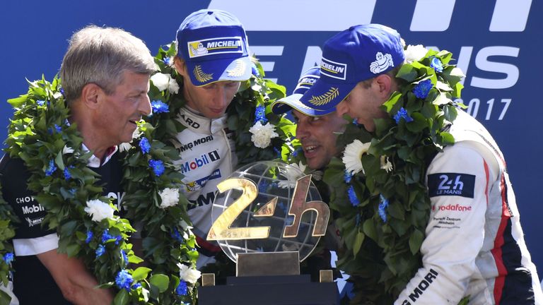 Porsche's Timo Bernhard, Earl Bamber and Brendon Hartley celebrate on the podium