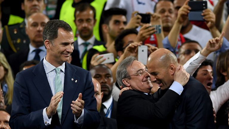 Zinedine Zidane is congratulated by Real Madrid president Florentino Perez after their Champions League win in Cardiff