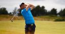Harrington leads as Rory exits