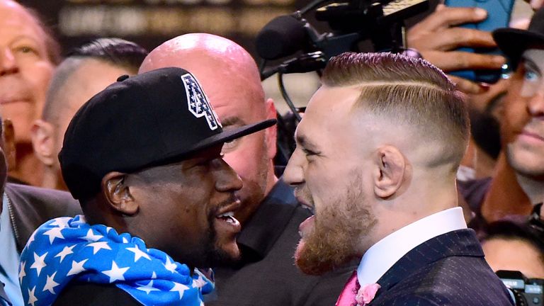 Mayweather and McGregor stand face to face during their first media conference