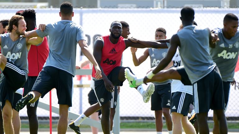 Lukaku stretches with team-mates