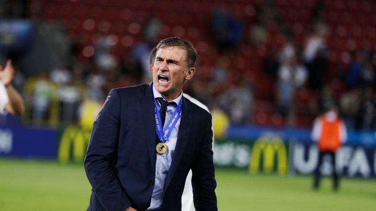 Stefan Kuntz celebrates Germany's victory over Spain