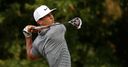 Olesen shares lead as Rory slips