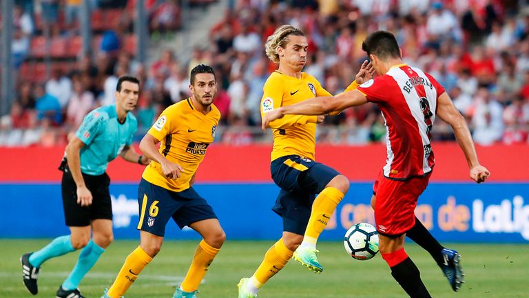 Antoine Griezmann was sent off as Atletico Madrid failed to win in their visit to newly-promoted Girona