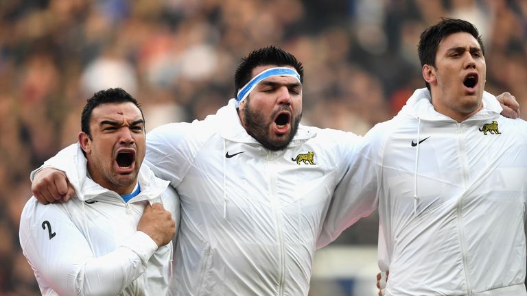 Captain Agustin Creevy (L) leads the national anthem ahead of Argentina's summer test against England