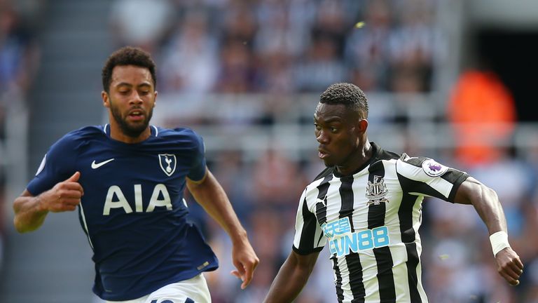 Christian Atsu attempts to get past Mousa Dembele