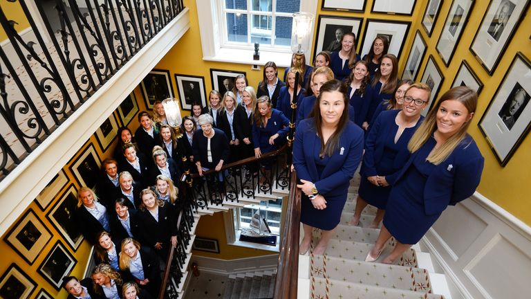 Prime Minister Theresa May with members of the England Women's cricket and rugby teams