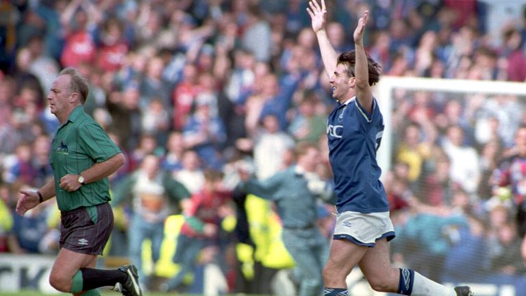 Defender David Unsworth runs from the field of play after Everton's dramatic win against Wimbledon