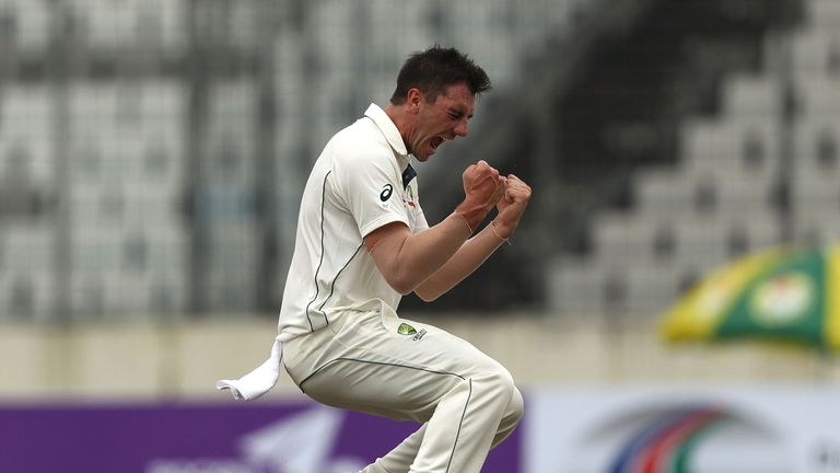 Cummins celebrates taking the wicket of Bangladesh's Sabbir Rahman Roman
