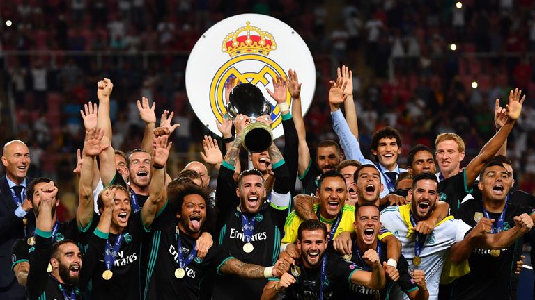 Sergio Ramos lifts the Super Cup after Real Madrid beat Manchester United 2-1 in Macedonia