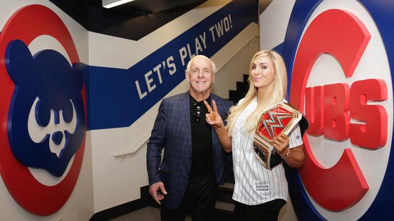 Charlotte, pictured here with her father Ric Flair, won the Raw women's championship four times