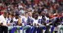 WATCH: Cowboys kneel before anthem