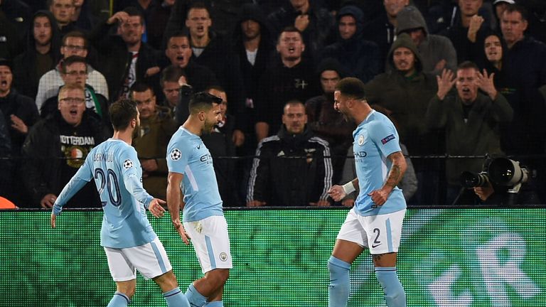 Sergio Aguero (centre) celebrates putting City 2-0 up