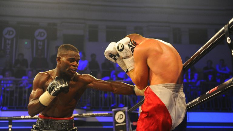 Joshua Buatsi lands a stiff jab to the body of Baptiste Castegnaro